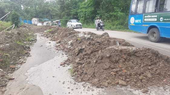 Landslide near the under construction bus stand caused a 50 meter stretch of road to collapse, making travel risky.