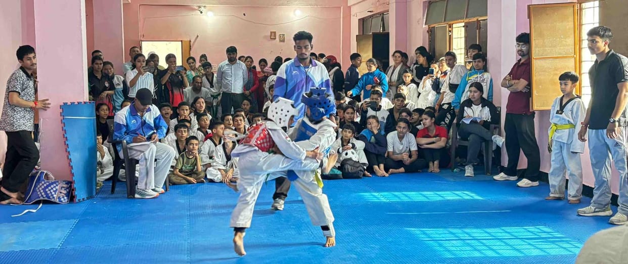 407 players of the district are showing their strength in badminton and taekwondo