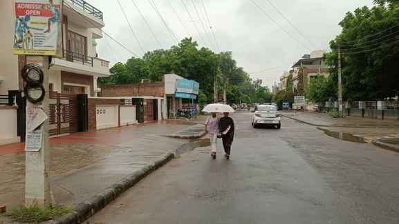 Drizzling rain brought relief from the humid heat, rain expected for the next four days