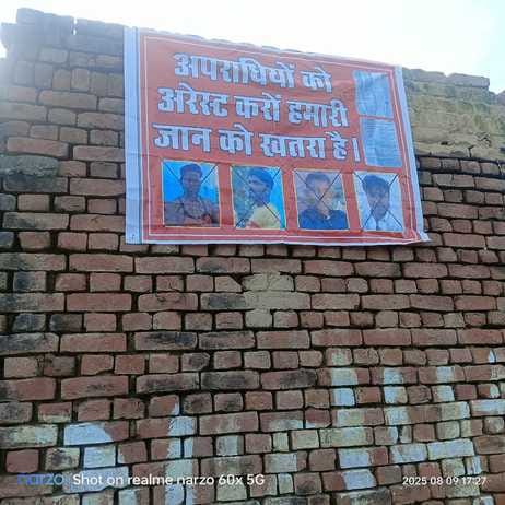The accused were not arrested... The woman put up a banner and threatened to leave the village