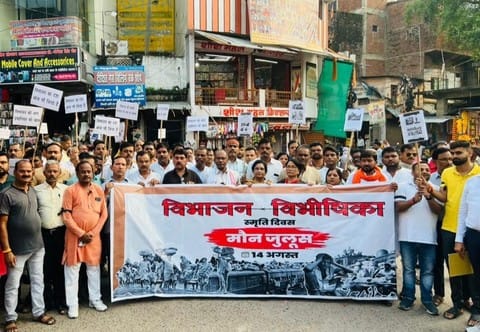 BJP members took out a silent procession with black bands on their hands