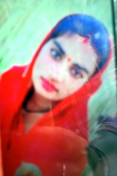 A woman died after falling from a bike which jumped on a breaker