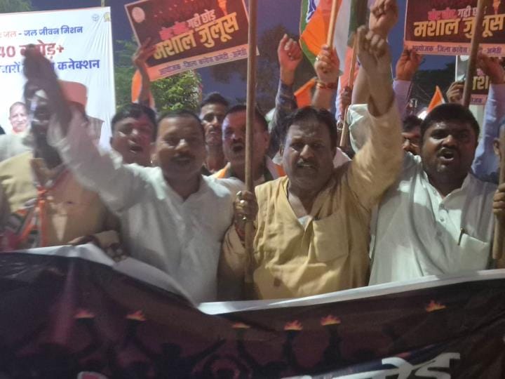 Congressmen took out a torchlight procession in protest against the central government