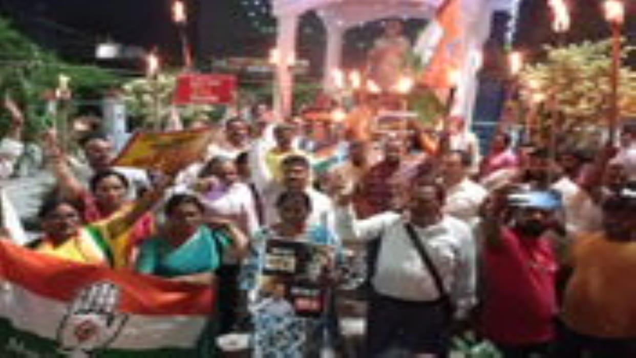 Congress workers took out a torchlight procession