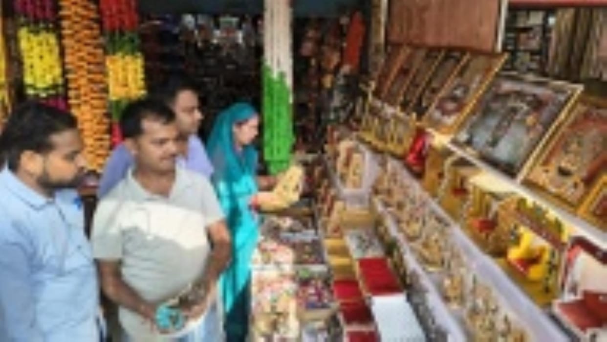 Market decorated with Laddu Gopal, clothes and crown