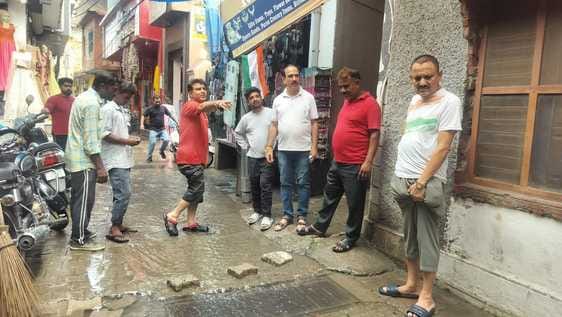 There is growing resentment among shopkeepers due to the lack of cleaning of the drain