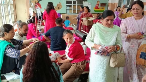 Goods given to the hospital, food items distributed to children