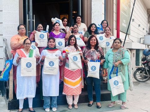Inner Wheel Club distributed jute bags with the message of environmental protection