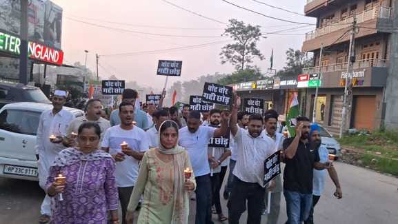 Candle march taken out against Election Commission in Ghumarvi