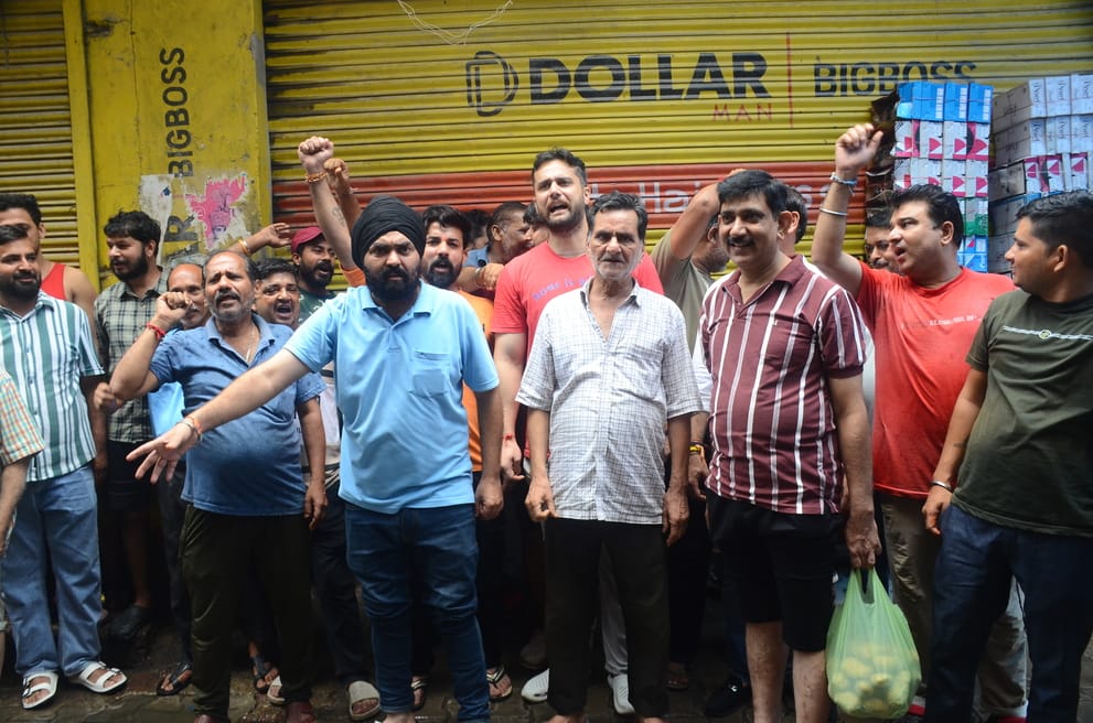 Shopkeepers protested when the blocked drain was not cleaned