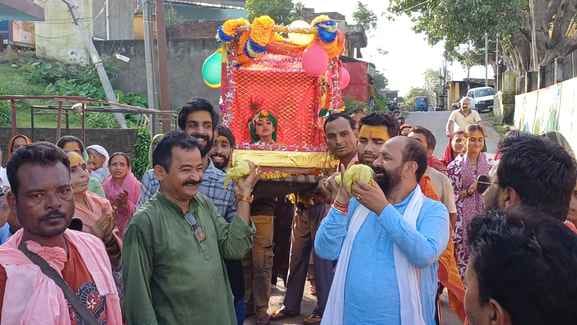 A grand procession with the child form of God was taken out in the city