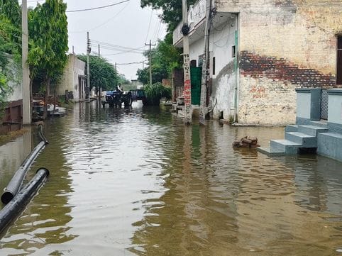 80 houses surrounded by water due to overflowing of ponds