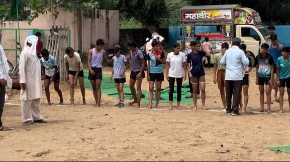 Meenakshi tops in long jump competition