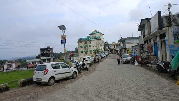 Parking is not made in Bijhar, vehicles are parked on the side of the main road in the market.