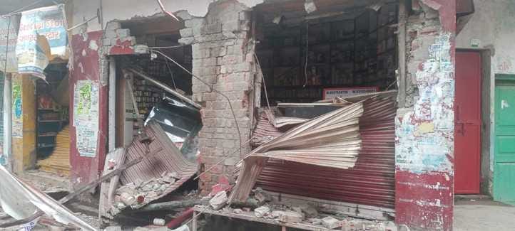 The bullies broke the shutters of three shops using a JCB