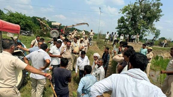 There was a stir due to the threat of suicide, amidst the protest the officials found a solution with wisdom
