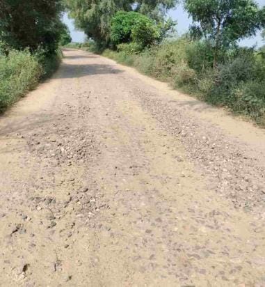For a year, stones have been dumped on Kirtan Shahpur Road, causing trouble to the locals.