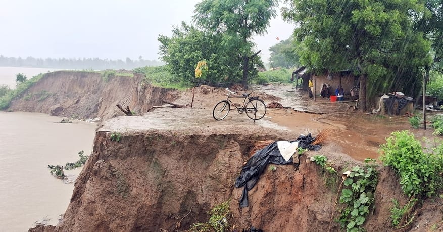 The waves of the Ganges are carrying away the homes along with the farms