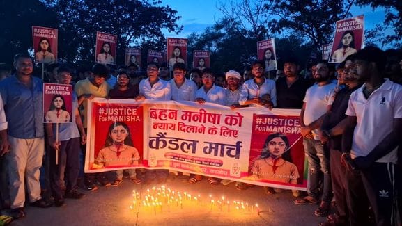 Youth Congress took out a candle march in anger against the murder of a teacher