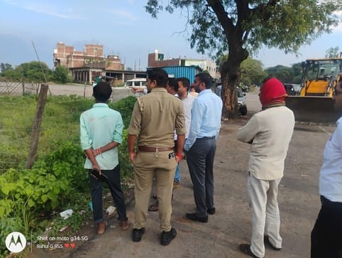 Bulldozer runs on encroachment in front of medical college