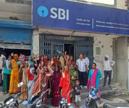 Women of self-help group demonstrated at the bank branch