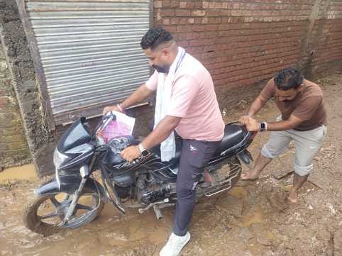 People kept collecting their scattered lives, the streets were filled with mud up to their knees