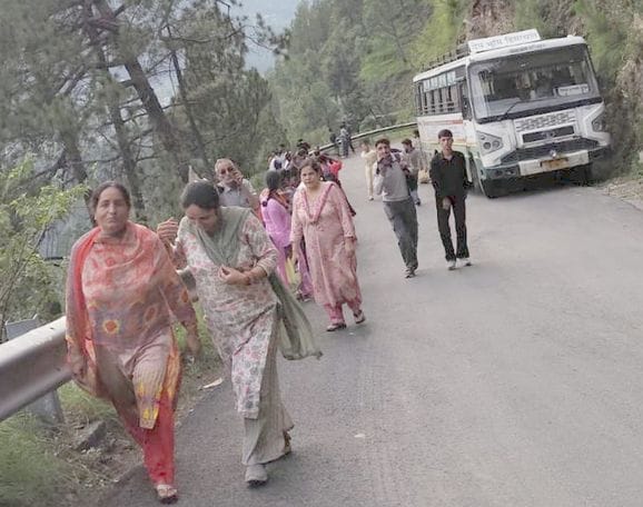 The bus gasped on the climb, the passengers set out on foot