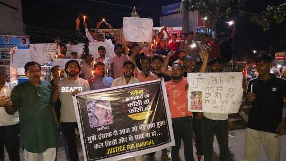 Expressed anger by taking out a candle march