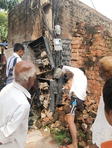 Broken boxes of meters installed on poles in Kila Mohalla, risk of accident