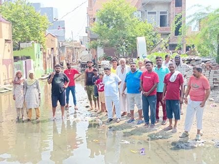 Contaminated water filled in the street due to sewer overflow