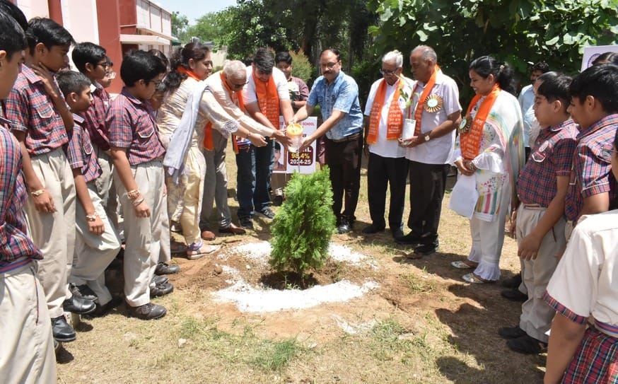 Student Sahil planted a peacock feather plant in Smriti Van
