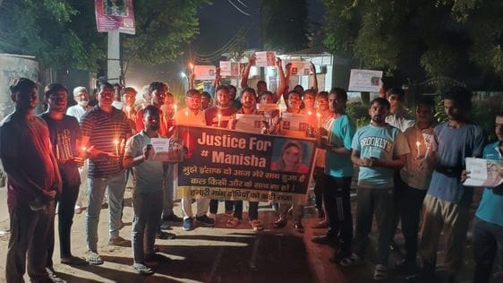 In Patheda, the youth took out a candle march at the bus stand