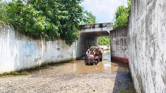 Flood water filled under the railway underpass, blocking the way