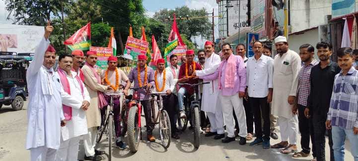 Cyclists from Badaun were welcomed with flower garlands