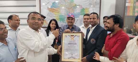 District Magistrate was honored by Yogasana Book of World Record Council