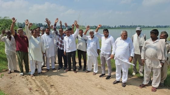 Angry farmers protested after their crops got submerged and demanded compensation