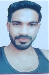 The body of a young man was found hanging from a tree