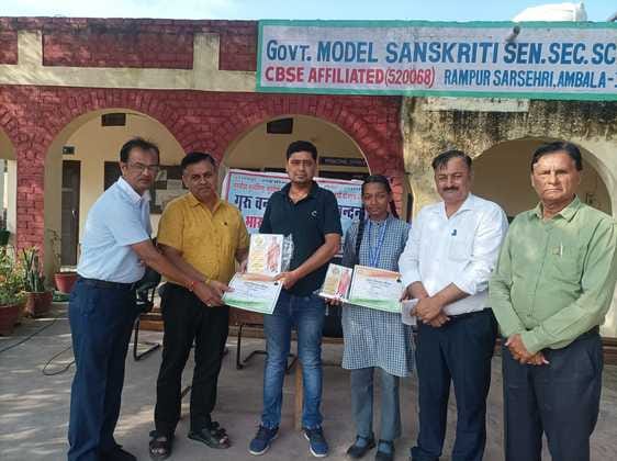Student Lalita and Professor Vivek Sharma were honored