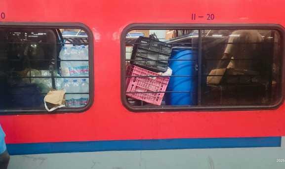 Pantry workers occupying seats in Darbhanga-Janayak Express by keeping luggage on them