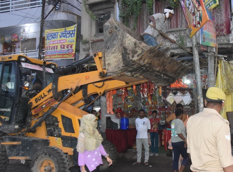 Bulldozers roared on encroachment for the second day, shops removed