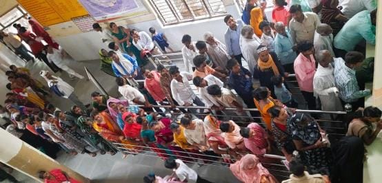 Patients queue up for registration, treatment and medicine