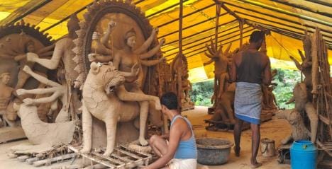 Sculptors are busy in giving beautiful form to the idols of Maa Durga