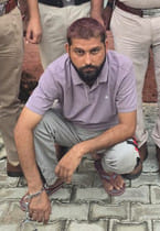 Accused of killing farmer arrested