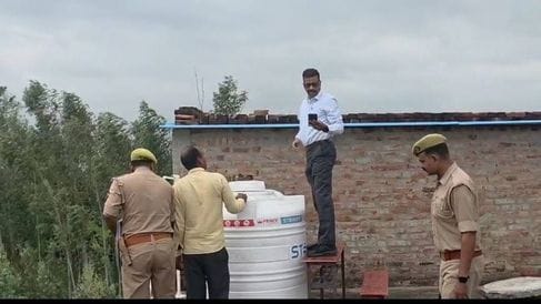 The body of the guard was found in a closed water tank on the roof of the school, murder suspected
