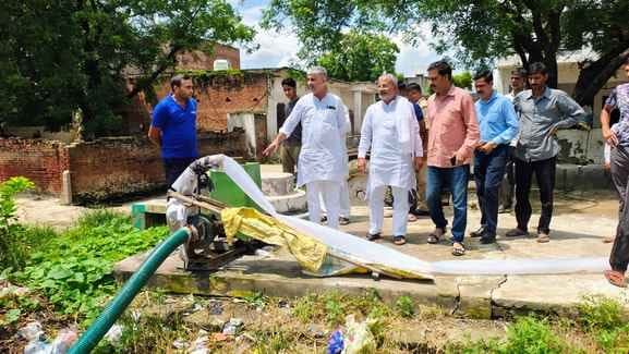 There was a discussion about the permanent solution to water drainage