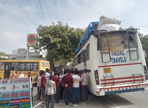 A private vehicle hit an empty school bus from behind
