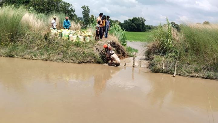 The bank of the canal broke... 50 acres of crops drowned.