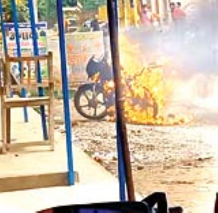 He set his bike on fire in a crowded market