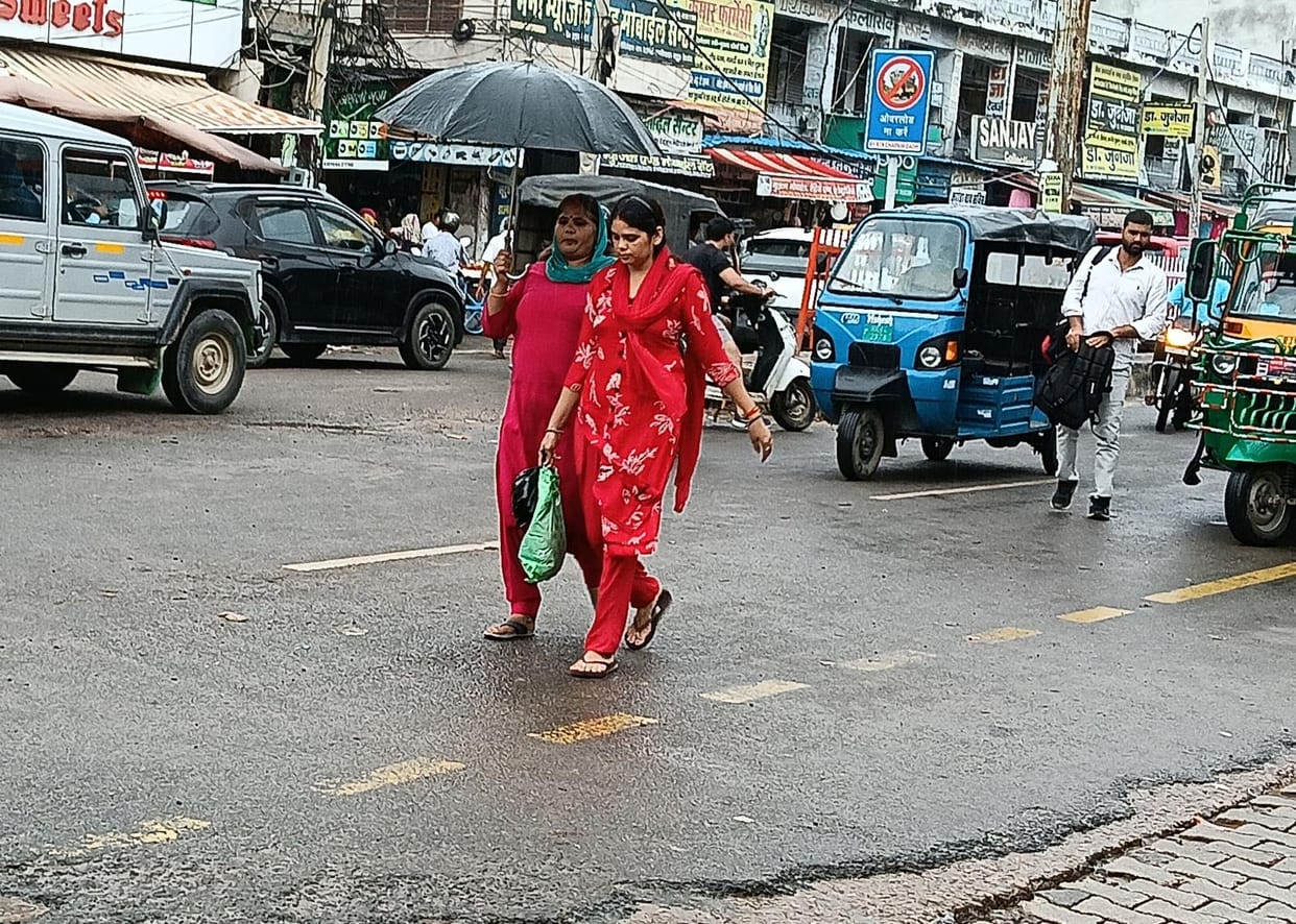 Weather is pleasant due to rain, relief from humidity