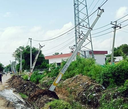Electricity pole bent due to soil erosion, wires damaged, villagers spent the night in darkness